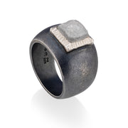 Todd Reed ring made with a large raw diamond cube(9.1ct), palladium, and sterling silver with patina